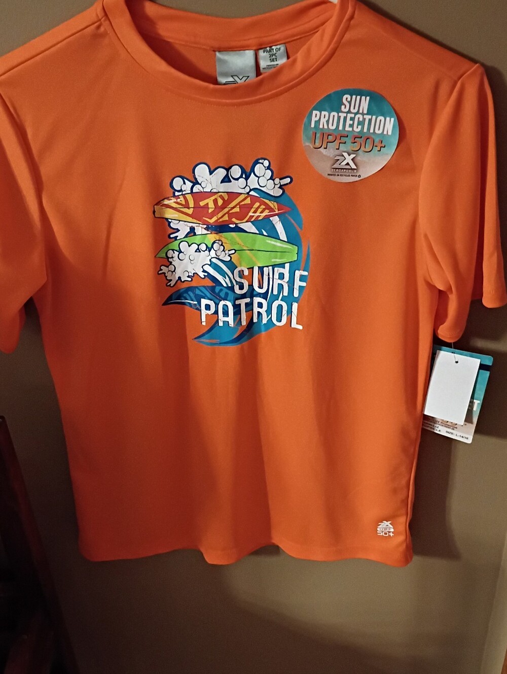 ZeroXposur Orange 'Surf Patrol' Short Sleeve Sun Shirt. Originally A 2 Piece Set